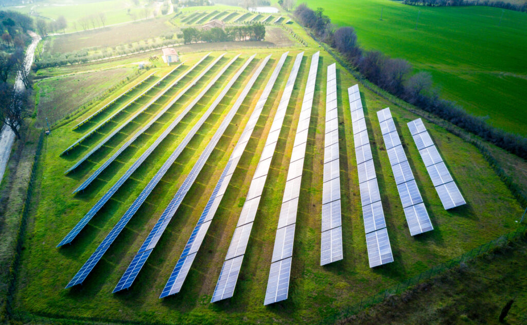 Aerial,View,Of,Solar,Panels,On,A,Sunny,Day.,Power