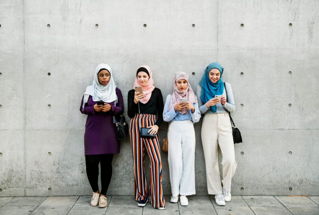 Islamic,Friends,Using,Smart,Phone