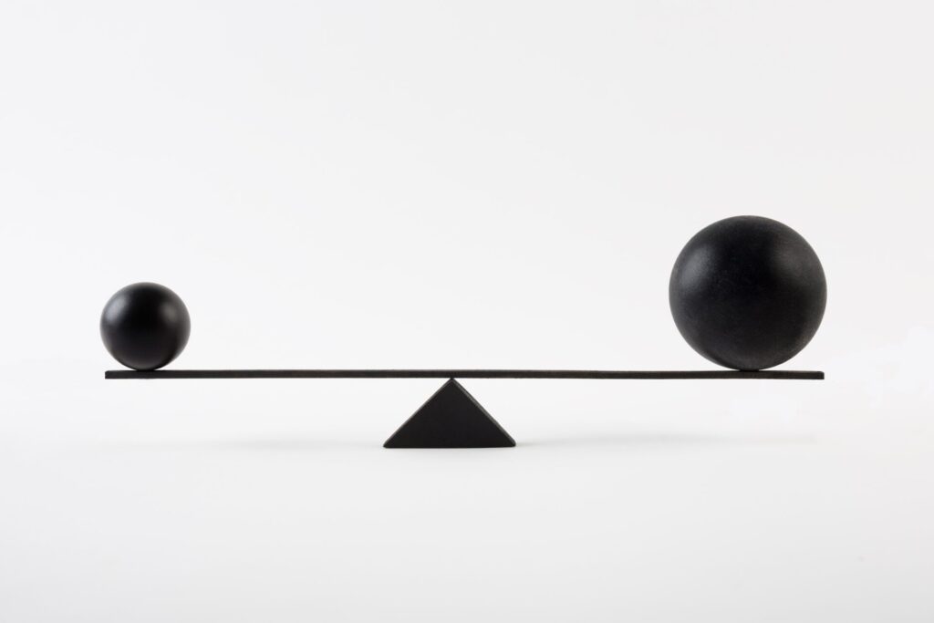 Small,And,Big,Black,Spheres,Balancing,On,Minimalist,Style,Geometric