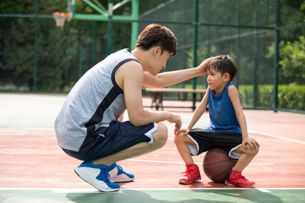Happy,Father,And,Son,Playing,Basketball,On,Playground