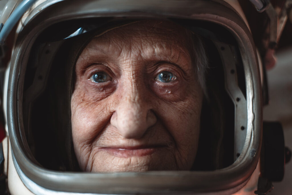 Cinematic,Portrait,Of,An,Old,Astronaut,Coming,Back,Home.,Grandmother