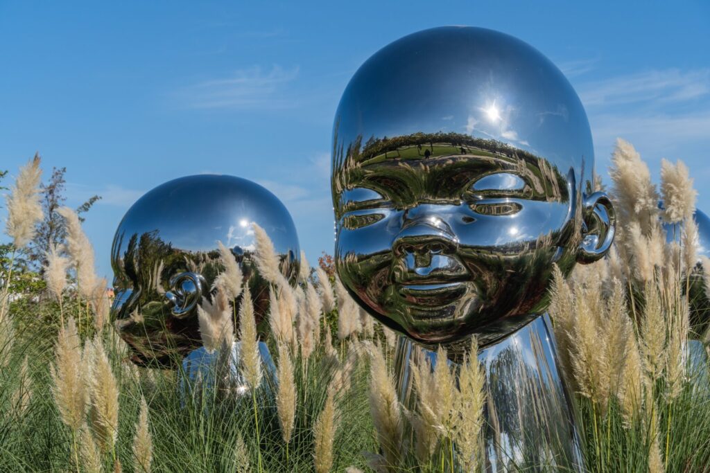 Fragment,Of,Mirrored,Sculptural,Installation,"inner,Child",With,Children's,Faces.