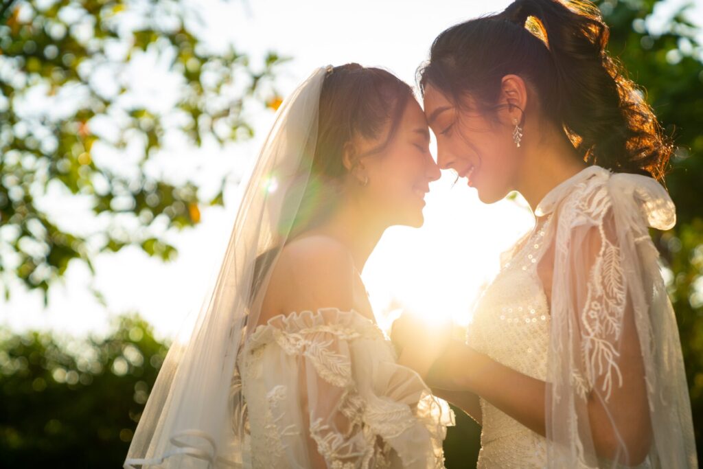 Portrait,Of,Beautiful,Asian,Woman,Lesbian,Couple,In,Wedding,Dress