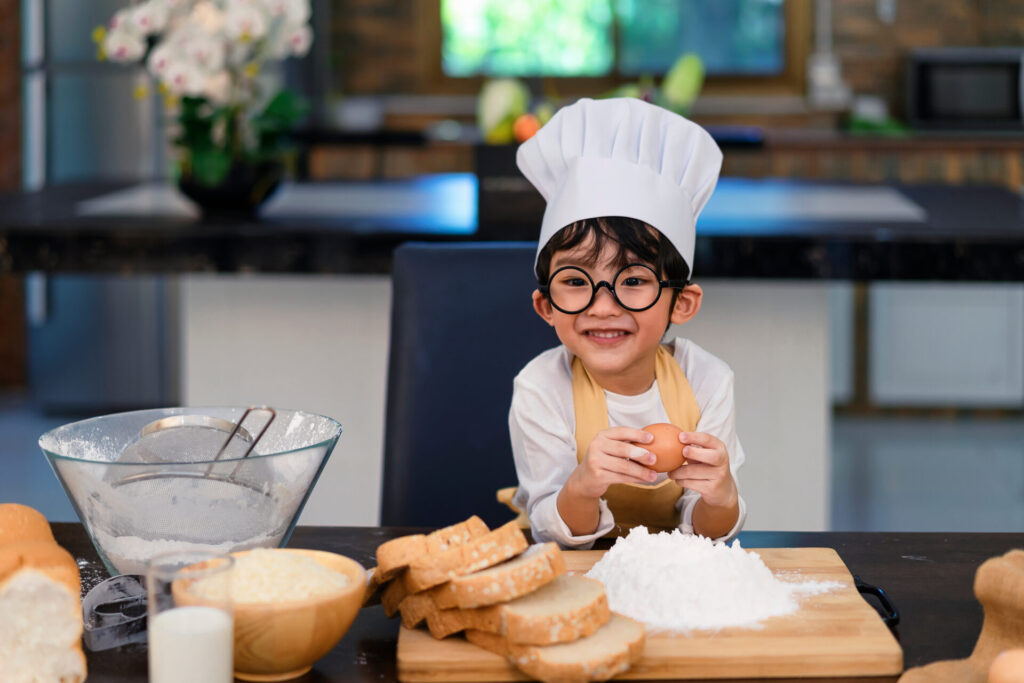 Little,Boy,In,Kitchen.cute,Boy,Wears,A,Chef,Hat,And