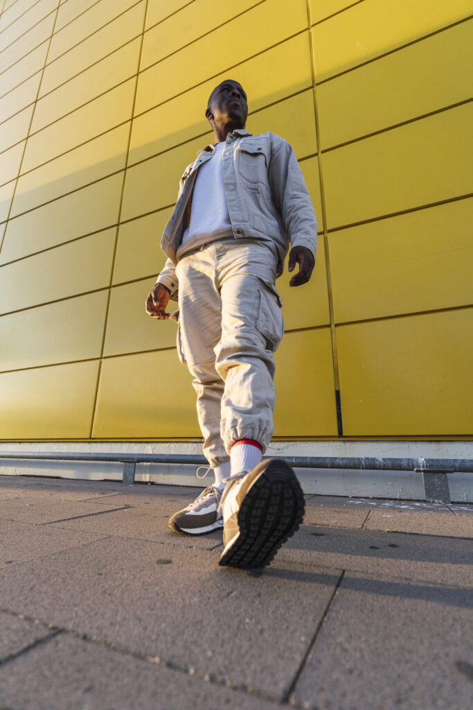 A,Vertical,Low,Angle,Shot,Of,A,Young,Black,Male