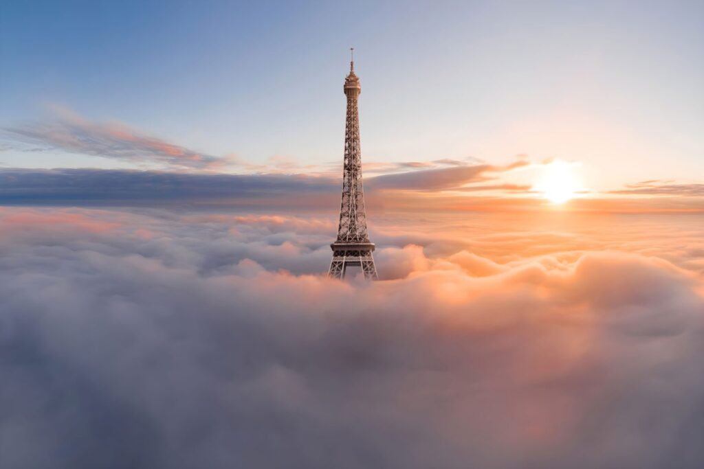 The,Eiffel,Tower,,Paris,,France,In,Clouds,With,Golden,Hours,