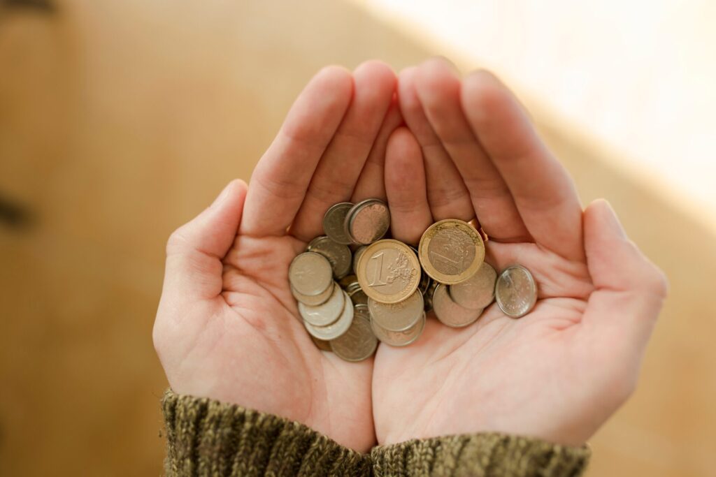 Hands,Of,Young,Man,Holding,Coins