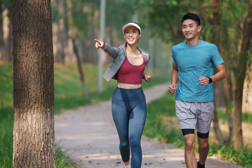 Young,Couples,To,Running,In,The,Woods