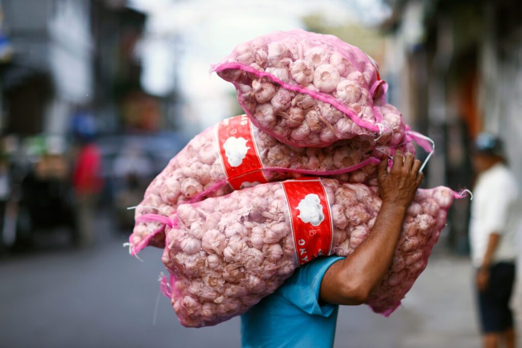 Daily,Worker,At,Traditional,Food,Market,,Man,Carrying,Heavy,Bags