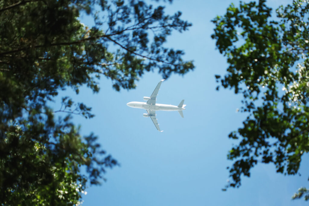 Bottom,View,On,Jet,Airplane,Flying,In,The,Sky,Overhead