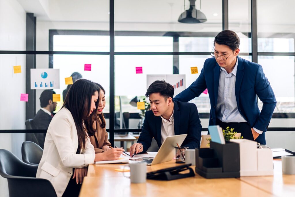 Group,Of,Asian,Business,Meeting,And,Discussing,Strategy,Startup,Project